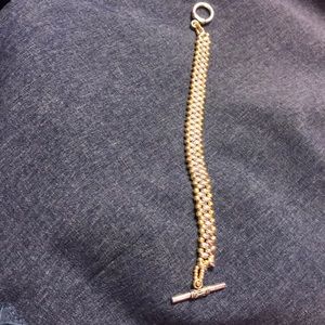 Hand beaded silver & gold toggle closure bracelet.